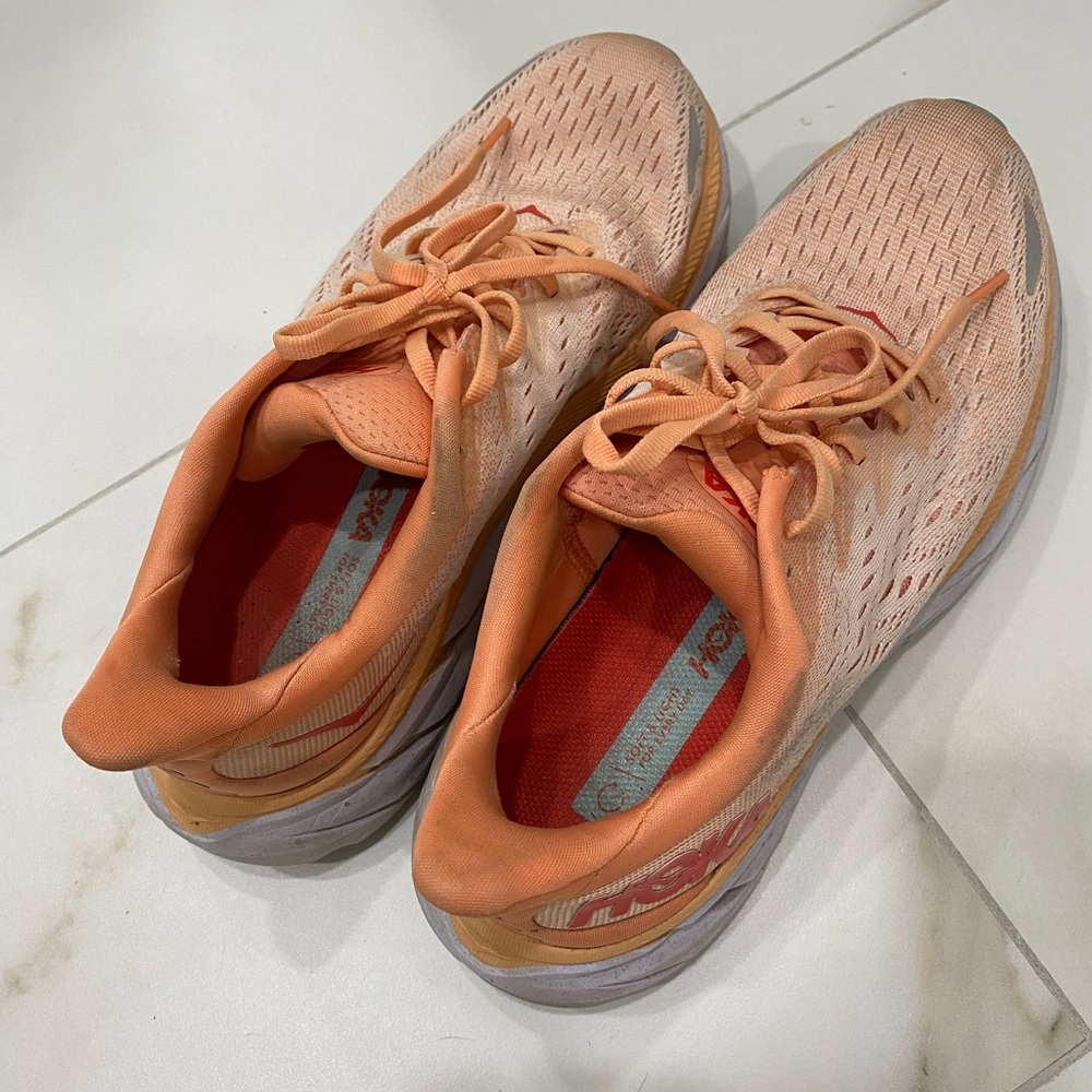 Hoka Orange and Teal Clifton 8